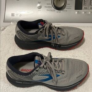 Brooks Gray and Blue Athletic Shoes with Red Soles